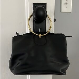 Metal handle handbag